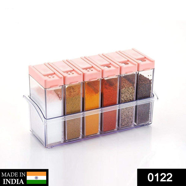 Plastic spice jars in assorted colors, arranged neatly