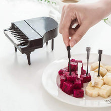 Fun piano-shaped fruit forks for snacks.