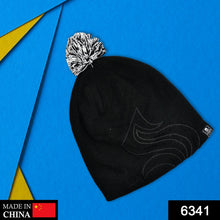 Black inside fur beanie cap with a skull design.