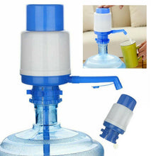 Hand press water pump for easily dispensing water from large bottles.